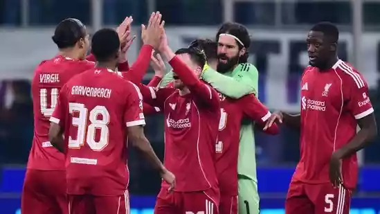 Liverpool secured a 1-0 Champions League victory over Inter Milan, with Dominik Szoboszlai scoring a late penalty, despite Mohamed Salah's absence