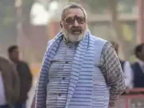 Union Minister Giriraj Singh criticizes West Bengal Chief Minister Mamata Banerjee for allegedly supporting illegal Bangladeshis. Banerjee, in turn