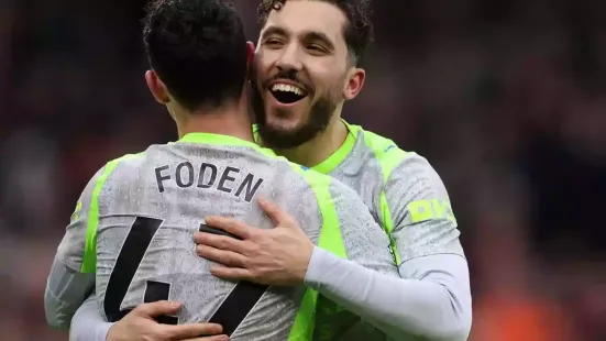 Manchester City beat Nottingham Forest 2-1 to move provisionally to the top of the Premier League table after Rayan Cherki grabbed a goal and assist away