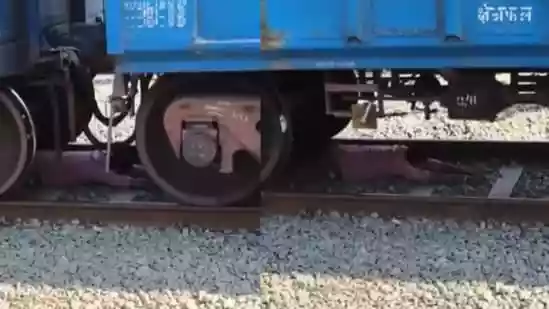 A dramatic incident unfolded at Kesamudram station in Telangana, where a man narrowly escaped a serious accident while attempting to crawl under a goods train