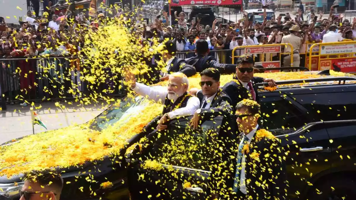 Massive crowds greet PM at roadshow ahead of Gita recital event at Sri Krishna Mutt