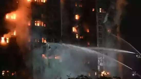 Massive fire engulfs residential towers in Hong Kong