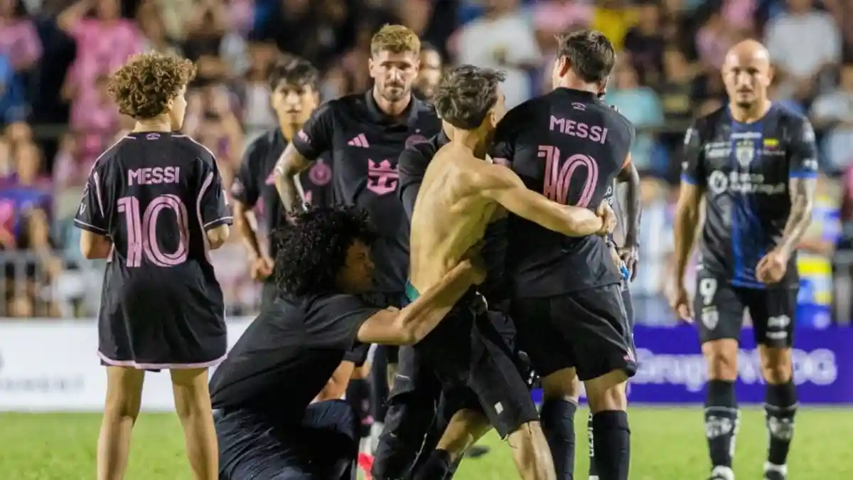Eight time Ballon d’Or winner Lionel Messi was nearly taken to the ground by a fan who breached security measures to hug the World Cup-winning Argentine