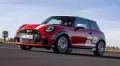 Mini JCW 1965 Victory Edition is a heritage-themed variant commemorating the 1965 Monte Carlo Rally win through Chili Red paint and historical design cues