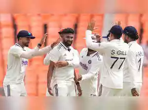 Mohammed Siraj and Jasprit Bumrah led India's bowling attack. They took seven wickets collectively. West Indies were dismissed for 162 runs on day one. This happened in the first Test match in Ahmedabad. Siraj secured four wickets for 40 runs. Bumrah contributed to the dismissals. Kuldeep Yadav also claimed two wickets. The West Indies innings concluded in 44.1 overs.