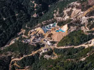Myanmar, a key rare earths supplier to China, faces disruption as rebel forces seize control of mines. This complicates Beijing's position, forcing it to support both the junta and the rebels for resource access. The situation highlights environmental damage from mining and raises concerns for global supply chains.