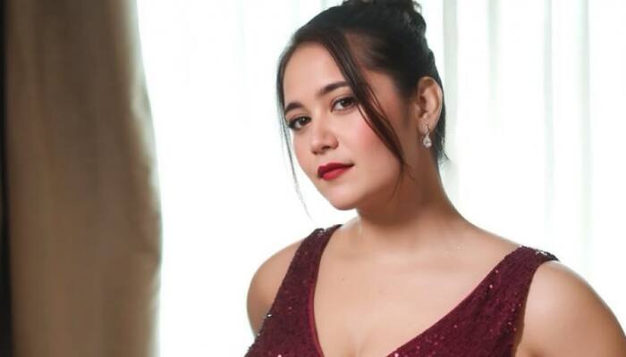 New Delhi: Archita Phukan, popularly known as Babydoll Archi, an Assam-based influencer with over 805k Instagram followers, has recently become the subject of intense online debate. Archita rose to fame after her viral reel featuring the song Dame Un Grrr by Romanian artist Kate Linn captivated social media users, sparking widespread admiration and curiosity about the young influencer.