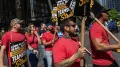 Management and labour unions for workers on North America's busiest rail line have been summoned to mediation after a strike threatened the morning commute for