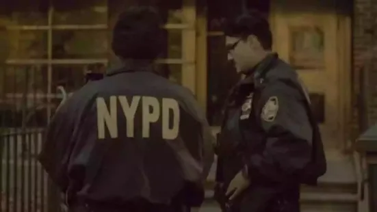 A man with a gun was killed Thursday in a shootout with police in New York City after he pointed his weapon at a man in an apartment building elevator and a