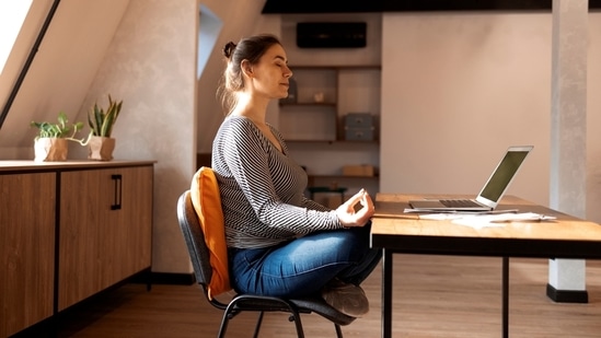 On Yoga Day, know the positive impact of yoga at work and what organisations and employees can do to include it in office. International Yoga Day 2025: Stress is so common in the workplace that it is often overlooked, brushed off as just a part of the daily hustle. But the strain from work responsibilities, long hours of sitting at the desk, staring at the screen, chasing deadlines relentlessly, and back-to-back meetings all add up, chipping away at productivity, focus, and overall health over time. 