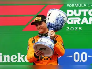 Oscar Piastri capitalized on Lando Norris's late mechanical failure to win the Dutch Grand Prix, extending his championship lead significantly. Norris's retirement from second place, coupled with crashes from Hamilton and Leclerc, shook up the race. Max Verstappen finished second, while Isack Hadjar celebrated his first F1 podium, marking a dramatic day for McLaren and the championship battle.