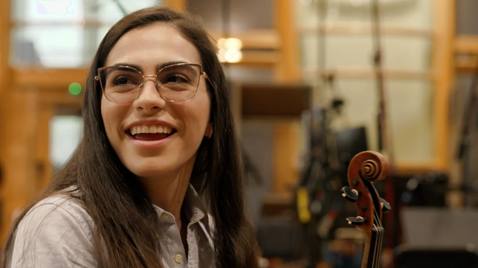 Pathrycia Mendonça never has to worry about jet lag. The 26-year-old has just jetted into London, where she's about to play 10 nights at Wembley Stadium with Coldplay as part of Venezuela's Simón Bolívar Symphony Orchestra. The flight took 12 hours and meant leaving her beloved 10-month-old daughter at home with her mother – but the violinist is bursting with energy as she arrives for rehearsals at the iconic Air Studios in north London.