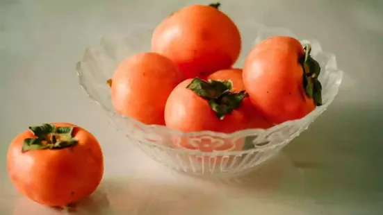 If you step into the market at this time of the year, one fruit seems to stand out – the persimmon. With a vibrant orange colour and honey-like sweetness
