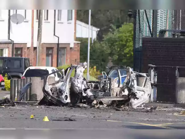 A car bomb exploded near a police station in Dunmurry, Northern Ireland. Police have declared a security alert and evacuated homes