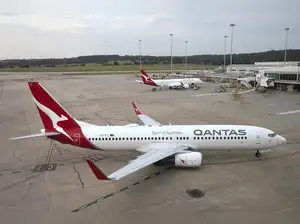 Qantas Airways has reduced bonuses for its CEO and team, acknowledging responsibility for a data breach affecting millions of customers. CEO Vanessa Hudson's bonus was cut by A$250,000, despite the airline posting near-record profits and a share price surge.