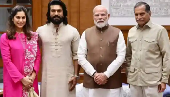 Ram Charan met Prime Minister Narendra Modi to discuss the Archery Premier League, praising the PM's support for Indian sports and sharing moments from their meeting on Instagram. Mumbai: Telugu star Ram Charan recently met Prime Minister Narendra Modi on Saturday. The actor took to his Instagram, and shared several pictures from his meeting with the PM.Ram Charan met Prime Minister Narendra Modi to discuss the Archery Premier League, praising the PM's support for Indian sports and sharing moments from their meeting on Instagram.Mumbai: Telugu star Ram Charan recently met Prime Minister Narendra Modi on Saturday. The actor took to his Instagram, and shared several pictures from his meeting with the PM.The two met with regards to the Archery Premier League. PM Modi also presented a statue of a lord to the actor.The actor penned a long note in the caption, as he wrote, “Honoured to meet our prime minister shri @narendramodi jee on the success of the world's first Archery Premier League, led by Anil Kamineni Garu. PM JI's guidance & passion for sports will help us preserve & promote the legacy of archery worldwide”.
