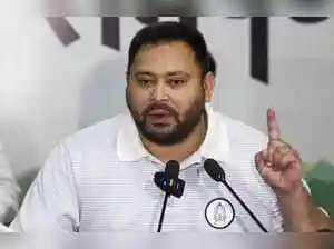 RJD leader Tejashwi Yadav has pledged that if the INDIA bloc wins the Bihar Assembly elections, they will enact a law within 20 days of forming the government to guarantee at least one government job per family. He highlighted the NDA's failure to provide jobs over two decades and claimed his previous tenure saw five lakh jobs created.RJD leader Tejashwi Yadav has pledged that if the INDIA bloc wins the Bihar Assembly elections, they will enact a law within 20 days of forming the government to guarantee at least one government job per family. He highlighted the NDA's failure to provide jobs over two decades and claimed his previous tenure saw five lakh jobs created.Ahead of Bihar Assembly elections, RJD leader Tejashwi Yadav on Thursday promised that if the INDIA bloc came to power in Bihar, it would bring an Act to ensure that every family in the state had a member with a government job.<br><br>The opposition leader added that the proposed Act will be brought 