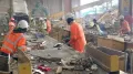 The dust at this busy recycling plant is pervasive and the steady noise of hoppers and conveyor belts makes this a challenging environment to work in