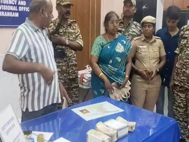 Authorities seized nearly Rs 11 lakh in cash from a Dravida Munnetra Kazhagam functionary's home in Tiruchirappalli. The money was allegedly intended for voter