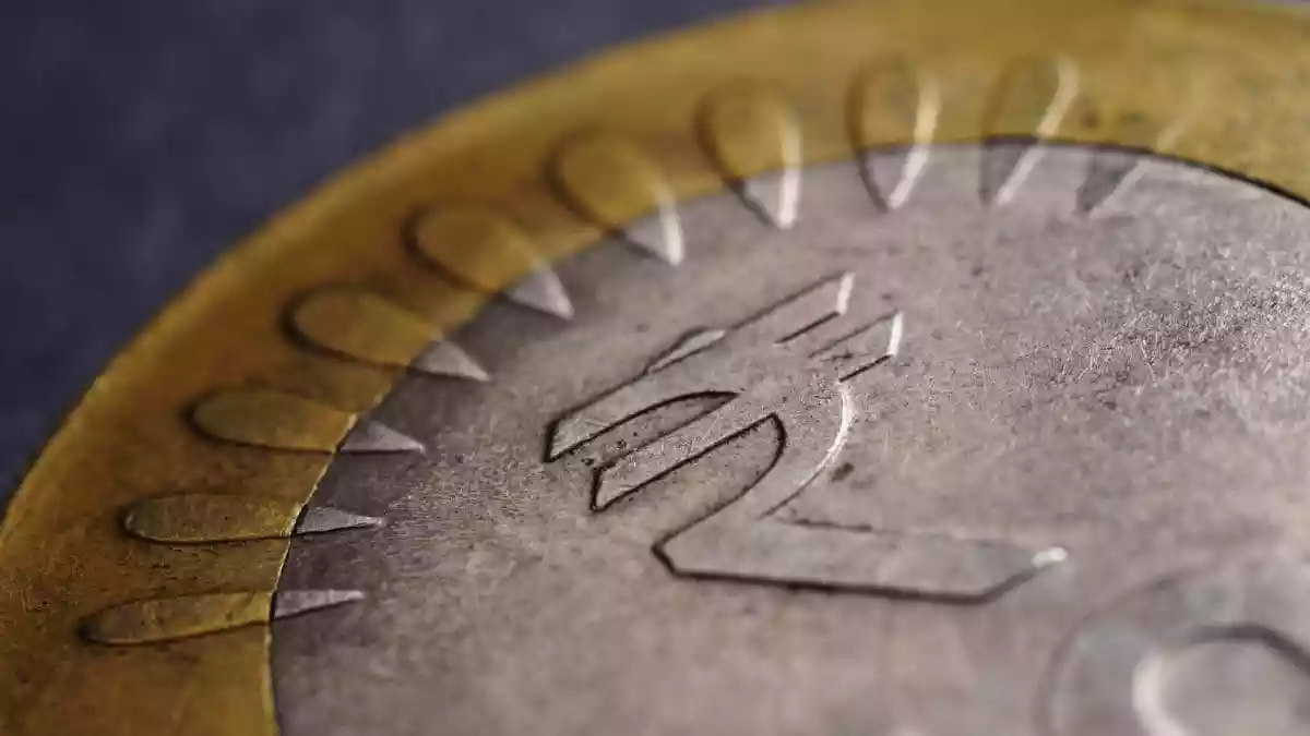 The Indian rupee fell to a fresh record low on Monday, pressured by a prolonged stalemate in US–India trade negotiations, as well as continued foreign