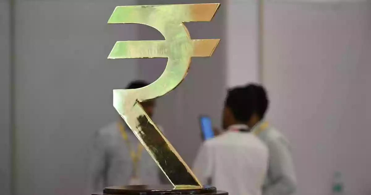 Rupee slumps to record low