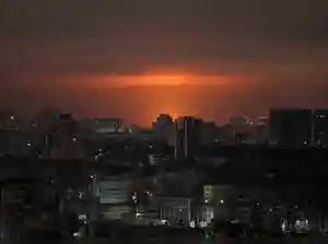 Kyiv's railway hub and infrastructure faced a massive Russian drone and missile assault, causing damage and train cancellations. Ukraine's energy sector and