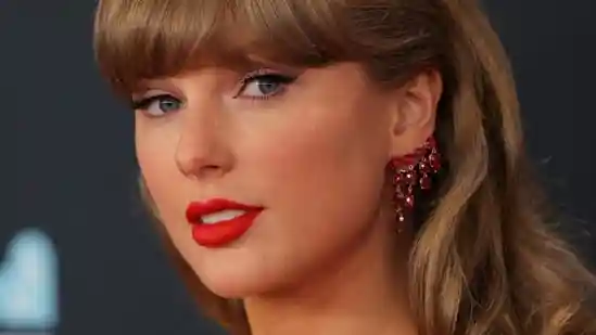 Selena Gomez married her boyfriend Benny Blanco in a private California ceremony on Saturday. Gomez shared wedding photos on social media, while images of her Only Murders in the Building co-stars from the rehearsal dinner also emerged. The day before the wedding, Taylor Swift was spotted shielding herself with umbrellas as she arrived for her best friend's nuptials. On Saturday, a viral photo of Swift in a maroon gown led some to speculate she was the flower girl. However, the image was later identified as an AI-generated fake. It first circulated in December 2024 when Gomez and Blanco announced their engagement.