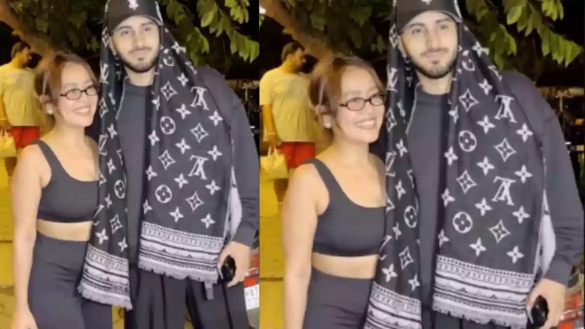 Singer Neha Kakkar was spotted with her husband, Rohanpreet Singh, after a long time. They were seen together in Bandra, Mumbai, seemingly after a dinner outing, and looked adorable together. In a video posted on Instagram, Neha Kakkar and her husband, Rohanpreet Singh, were seen exiting an eatery when they were approached by one of their fans. The doting wife, with her cheerful personality, was unable to stop giggling while they were recorded by the shutterbugs. The duo even paused for a moment to pose for the lens and then departed the place in their black swanky car.Singer Neha Kakkar was spotted with her husband, Rohanpreet Singh, after a long time. They were seen together in Bandra, Mumbai, seemingly after a dinner outing, and looked adorable together.In a video posted on Instagram, Neha Kakkar and her husband, Rohanpreet Singh, were seen exiting an eatery when they were approached by one of their fans. The doting wife, with her cheerful personality, was unable to stop giggling while they were recorded by the shutterbugs. The duo even paused for a moment to pose for the lens and then departed the place in their black swanky car.
