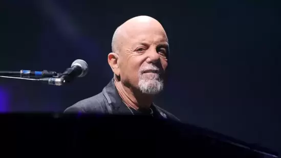 Singer-songwriter and pianist Billy Joel opened up about the dark and painful phase of life. Singer-songwriter and pianist Billy Joel opened up about the dark and painful phase of life. After the premiere of his new documentary, Billy Joel: And So It Goes, at the Tribeca Festival, the ace musician shared that he underwent two suicide attempts and fell into a coma after he had an affair with his former bandmate's wife. (Also read: Billy Joel brain disorder diagnosis: List of canceled concerts and how to get ticket refunds?)