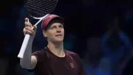 Italy's Jannik Sinner got his title defence off to a solid start with a dominant straight sets win over ailing Canadian Felix Auger-Aliassime at the ATP Finals