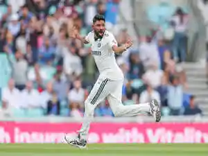 Siraj has played eight matches so far this year and claimed 37 wickets at an average of 26.91, compared to Muzarabani's 36 wickets at an average of 28.63 in 9 Tests. India's right-arm seamer Mohammed Siraj on Monday surpassed Zimbabwe fast bowler Blessing Muzarabto become the highest wicket-taker in Tests in 2025. <br><br>Siraj accomplished this milestone when he bowled out Shai Hope (103 runs) during the second session of the fourth day of the 2nd Test of the two-match series against West Indies being played at the Arun Jaitley Stadium here. <br><br>Siraj has played eight matches so far this year, where he has bowled 1,575 balls (262.3 overs) and claimed 37 wickets at an average of 26.91. He also recorded 39 maidens, conceded 996 runs, and achieved his best bowling figures of 6 for 70. His economy rate stood at 3.79, with a strike rate of 42.56, and he has also taken two four-wicket hauls and two five-wicket hauls. <br><br>On the other hand, Muzarabani has appeared in nine matches, bowling 1,660 balls (276.4 overs) and taking 36 wickets at an average of 28.63. He bowled 47 maiden overs, gave away 1,031 runs, and registered his best bowling performance of 7 for 58. His economy rate was 3.72, with a strike rate of 46.11, and he recorded three five-wicket hauls during the season. <br><br>Recapping the first session of Day 4 of the second and final Test, the visitors resumed the second session from 252/3 in 78 overs with Shai Hope and Roston