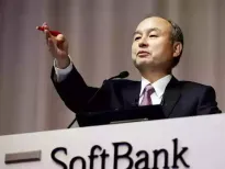 S&P Global Inc. lowered its outlook for SoftBank Group Corp. to negative from stable, saying plans for an additional $30 billion investment in OpenAI may hurt