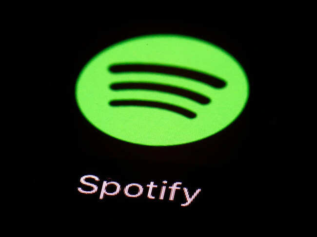 Spotify will not ban AI-generated music but will focus on preventing impersonation. The company introduced AI Credits for artists to disclose AI usage in songs