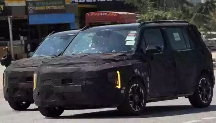 <strong>Kia Syros EV:</strong> Spy shots show a boxy silhouette similar to the ICE version, along with a charging flap placed on the front left