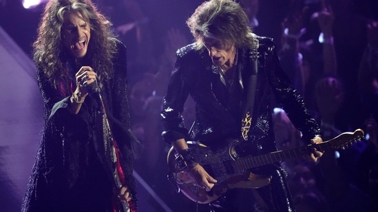 Steven Tyler and Joe Perry of Aerosmith paid tribute to the late Ozzy Osbourne, the Black Sabbath founder who passed away in July, in a touching tribute at the MTV Video Music Awards on Sunday. They were also joined by YUNGBLUD. The performance at the UBS Arena in New York started with YUNGBLUD singing 'Crazy Train' from the audience. The dark stage slowly lit up and Steven Tyler and Joe Perry were seen on the stage. The performed 'Changes,' followed by a walk where the three of them sang 'Mama, I'm coming home.'