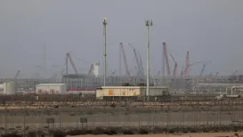 Oil and gas prices rose sharply and stock markets slid back on Thursday after Iranian strikes hit energy infrastructure in the Middle East