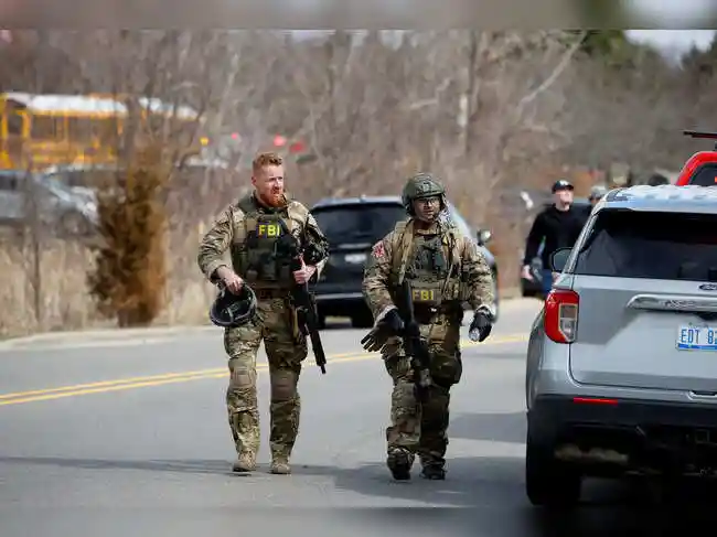 Suspect shot dead after crashing truck into Detroit-area synagogue