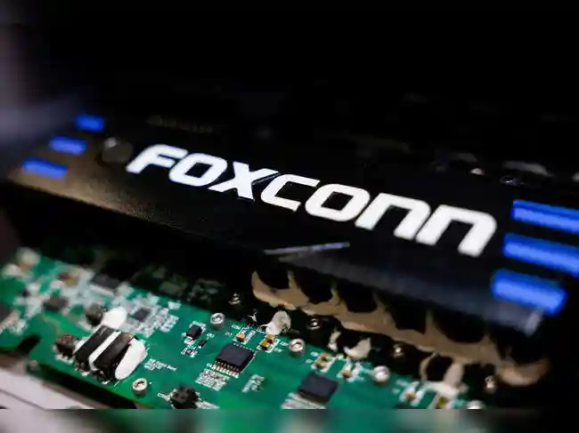 Taiwan's Foxconn, the world's largest contract electronics maker, reported record third-quarter revenue on strong demand for artificial intelligence products, though it missed the market forecast and offered caution about exchange rates.<br><br>Revenue for Nvidia's biggest server maker and Apple's top iPhone assembler jumped 11% from the same quarter last year to T$2.057 trillion ($67.71 billion), Foxconn said in a statement on Sunday.<br><br>While that was below the T$2.134 trillion LSEG SmartEstimate, which gives greater weight to forecasts from analysts who are more consistently accurate, Foxconn said the result was better than expected. <br><br>On a U.S. dollar basis, Foxconn said third quarter revenue rose 16.1% on year. The Taiwan dollar has strengthened some 8% so far this year against the greenback.<br><br>Strong AI demand led to robust revenue growth for its cloud and networking products division. Smart consumer electronics, which includes iPhones, posted a slight revenue decline, affected by exchange rates, the company said.<br><br>September revenue rose 14.2% on year to T$837.1 billion, a record for that month.<br><br>Operations are expected to 