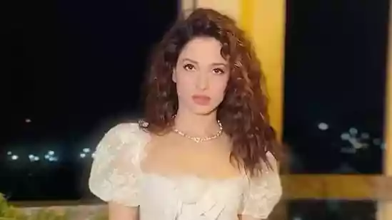 Tamannaah Bhatia's new Instagram post is winning over netizens. The actress donned a white, body-hugging lace dress. Oozing a soft charm mixed with old