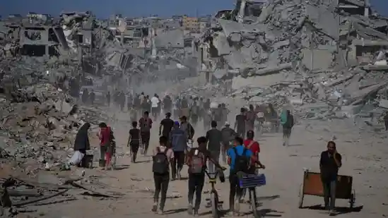 Tens of thousands of Palestinians headed back to the heavily destroyed northern Gaza Strip on Friday as a U.S.-brokered ceasefire came into effect in a deal that raised hopes for ending the Israel-Hamas war. All the remaining hostages were set to be released within days.Tens of thousands of Palestinians headed back to the heavily destroyed northern Gaza Strip on Friday as a U.S.-brokered ceasefire came into effect in a deal that raised hopes for ending the Israel-Hamas war. All the remaining hostages were set to be released within days.Questions remain over who will govern Gaza as Israeli troops gradually pull back and whether Hamas will disarm, as called for in U.S. President Donald Trump's ceasefire plan. Prime Minister Benjamin Netanyahu, who unilaterally ended a ceasefire in March, hinted that Israel might renew its offensive if Hamas does not give up its weapons.The latest truce nevertheless marks a key step toward ending a ruinous two-year war that was triggered by Hamas' 2023 attack on Israel. The fighting has killed tens of thousands of Palestinians and displaced around 90% of the Gaza population of some 2 million, often multiple times. Many of them will find fields of rubble where their homes once stood.