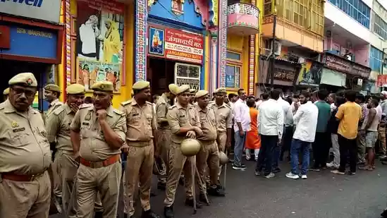 The Hanuman Chalisa controversy has escalated in Varanasi. A dispute arose when members of a particular community objected to the recitation of the Hanuman Chalisa at a temple. Following this, Hindu organisations staged a protest and recited Hanuman Chalisa on the roadside.The Hanuman Chalisa controversy has escalated in Varanasi. A dispute arose when members of a particular community objected to the recitation of the Hanuman Chalisa at a temple. Following this, Hindu organisations staged a protest and recited Hanuman Chalisa on the roadside.The dispute started when members of a particular community objected to the recitation of Hanuman Chalisa at a Hanuman temple in Varanasi's Madanpur area.The priest alleged that members of the community threatened him, leading to protests by Hindu organisations.According to police officials, the situation began escalating after a video surfaced online on Thursday, prompting swift action from the police.Also read: Complete schemes under Jal Jeevan Mission in Varanasi by March: Union minister Puri
