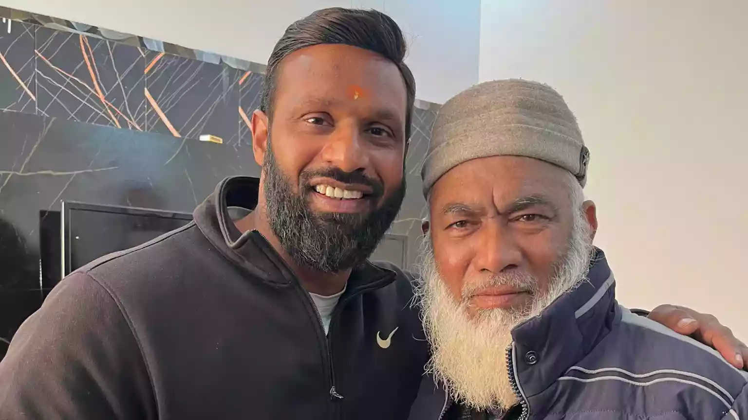With these five simple words, a Hindu man who stood up for a Muslim shopkeeper has been catapulted to fame and become an unlikely hero in India