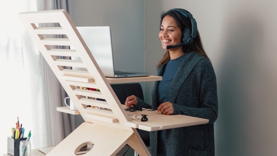 THE HUMAN body evolved to forage and hunt on the African savannahs, not to sit in a cubicle all day. The risks associated with sitting—from increased blood sugar levels to greater odds of dying from cancer—lead many health authorities to warn against spending too much time doing so. The sit-to-stand desk is a popular way of helping people get upright. But how effective is it?