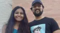 A dispute that began over heating a dish in a microwave has ended with two Indian students winning a $200,000 settlement from a US university