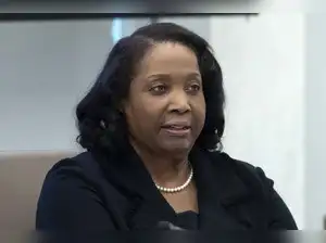 The Justice Department is investigating Federal Reserve Governor Lisa Cook for alleged mortgage fraud, stemming from a criminal referral regarding two properties she purchased in 2021. This probe coincides with Cook's legal challenge against President Trump's attempt to remove her, which she claims is an effort to undermine the Fed's independence.