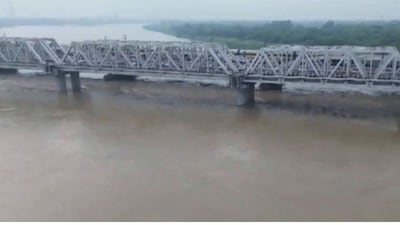 The rising water level of the Yamuna River in Delhi has raised concerns among residents living in nearby low-lying areas, with the river measured at 204.82 metres at 8 a.m. on Monday. Amid the growing alert, the Railways is closely monitoring the situation. Speed restrictions have already been imposed on the Old Yamuna Bridge, as the water level remains above the warning mark.