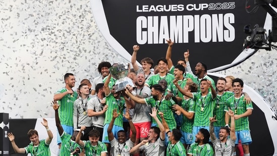 The Seattle Sounders stunned Lionel Messi and Inter Miami 3-0 on Sunday to win the Leagues Cup, completing their collection of North American trophies in front of a record crowd at Lumen Field. Osaze De Rosario scored in the 26th minute and Alex Roldan added a penalty in the second half before Paul Rothrock capped the scoring for the Sounders, whose determined defense stymied a star-studded Inter lineup led by Argentine icon Messi.