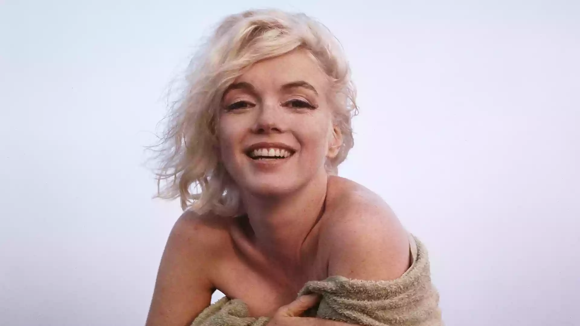 On the 100th anniversary of her birth, images from the Hollywood icon's final photoshoot reveal a carefree joyfulness that's far removed from the shocking