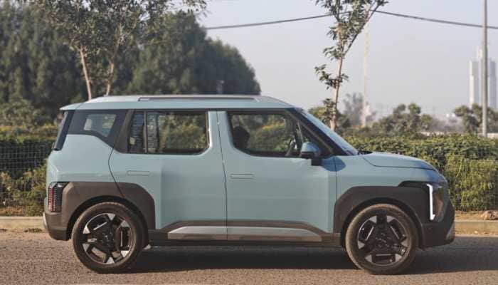 The upcoming Kia Syros EV has been spotted testing for the first time, giving us an early look at what Kia's latest electric SUV might bring to the market. Kia Syros EV: The upcoming Kia Syros EV has been spotted testing for the first time, giving us an early look at what Kia's latest electric SUV might bring to the market. While the official launch date hasn't been confirmed yet, it's expected to arrive in India sometime between January and March 2026, sold alongside the ICE-powered Syros.