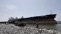 The Minerva Gloria is docked at a wharf in the Mississippi Sound, not far from the US's vast oil reserves in the Gulf of Mexico. The ship, 820ft (250m) long